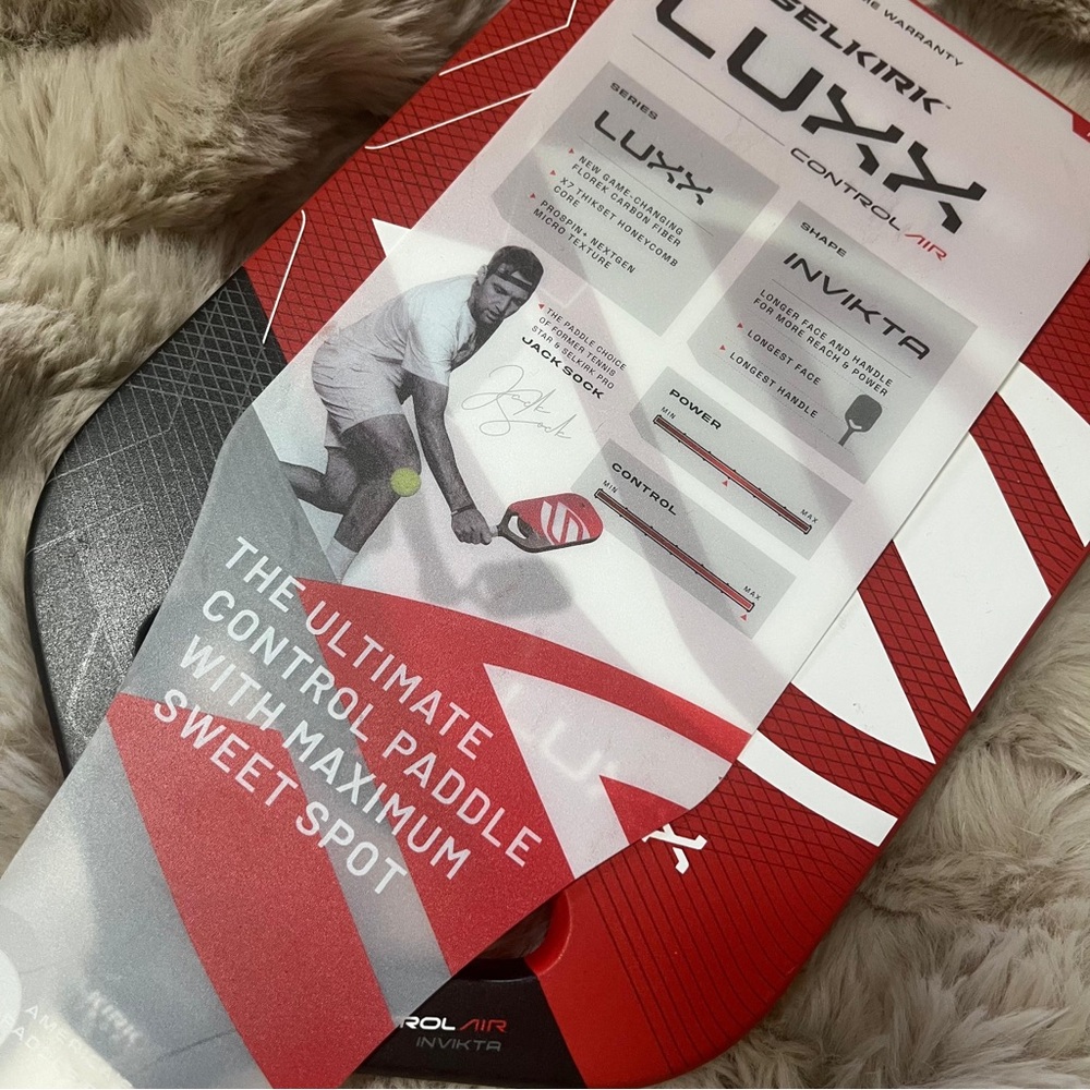 Red and white pickleball paddle - Picture 2 of 4